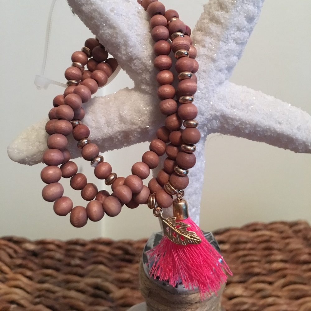 Elastic bracelets w/tassel and leaf